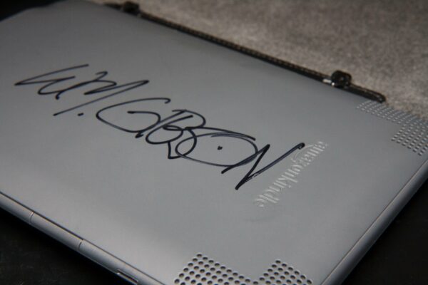 Kindle 3 back cover, signed by William Gibson
