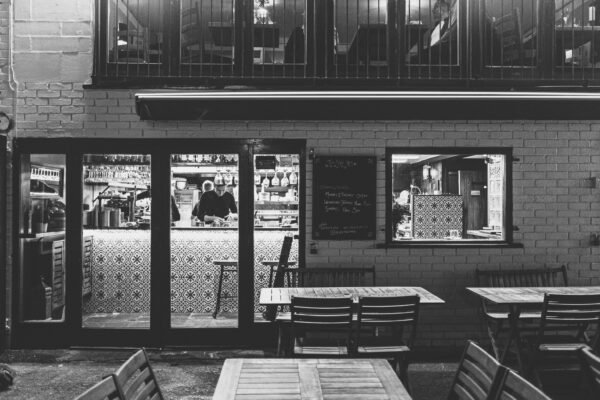 Olive Shed restaurant, Bristol, shot at night, looking from outside through the windows