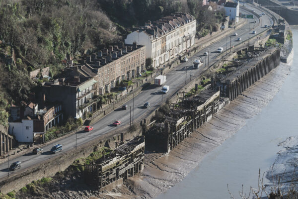 A photograph taken from the Clifton Suspension Bridge, looking down on the Colonnade, the Rock House, St Vincent's Parade and the old landing stages for Campbell's paddle steamers.